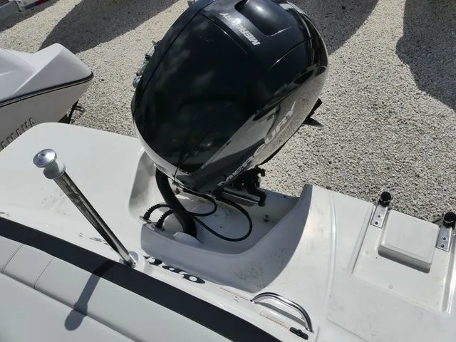 Slide: The Image of A 2021 Sea Ray SPX 190 outboard motor mounted on a boat hull. - 5