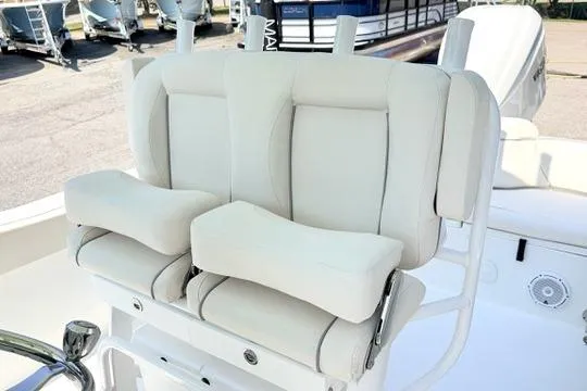 Slide: The Image of 2024 Sea Hunt Ultra 239 SE boat seats, featuring plush white upholstery and ergonomic design. - 21