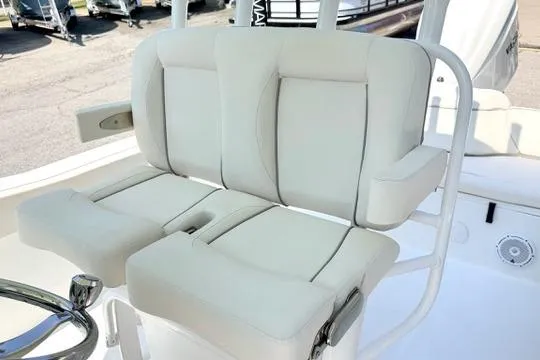 Slide: The Image of 2024 Sea Hunt Ultra 239 SE boat seating, featuring plush white cushions and modern design. - 22