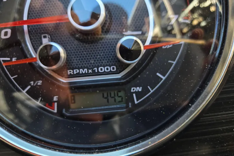 Slide: The Image of Close-up of 2024 Godfrey Sweetwater 2486 SB tachometer displaying RPM and fuel gauge. - 35