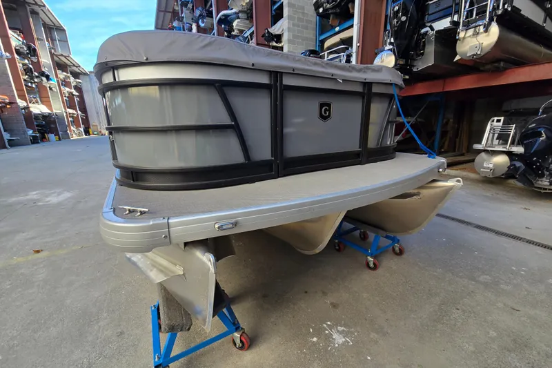Slide: The Image of 2024 Godfrey Sweetwater 2486 SB pontoon boat in storage facility. - 5