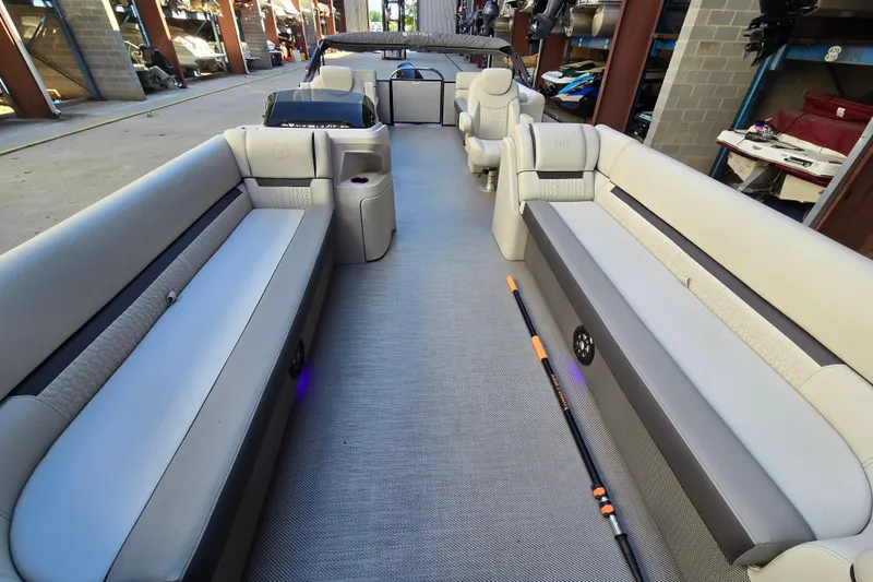 Slide: The Image of Interior of 2024 Godfrey Sweetwater 2486 SB pontoon boat with spacious seating. - 23