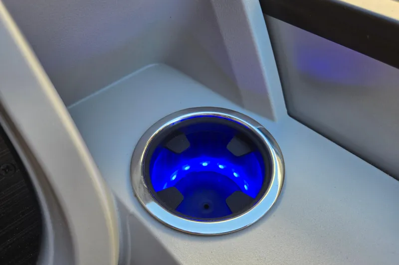Slide: The Image of Illuminated cup holder in 2024 Godfrey Sweetwater 2486 SB boat interior. - 41