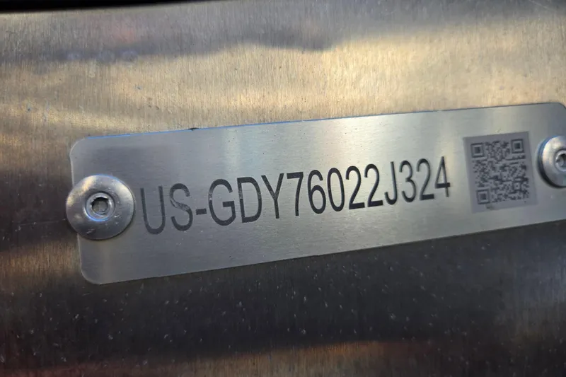 Slide: The Image of 2024 Godfrey Sweetwater 2486 SB identification plate with serial number and QR code. - 55