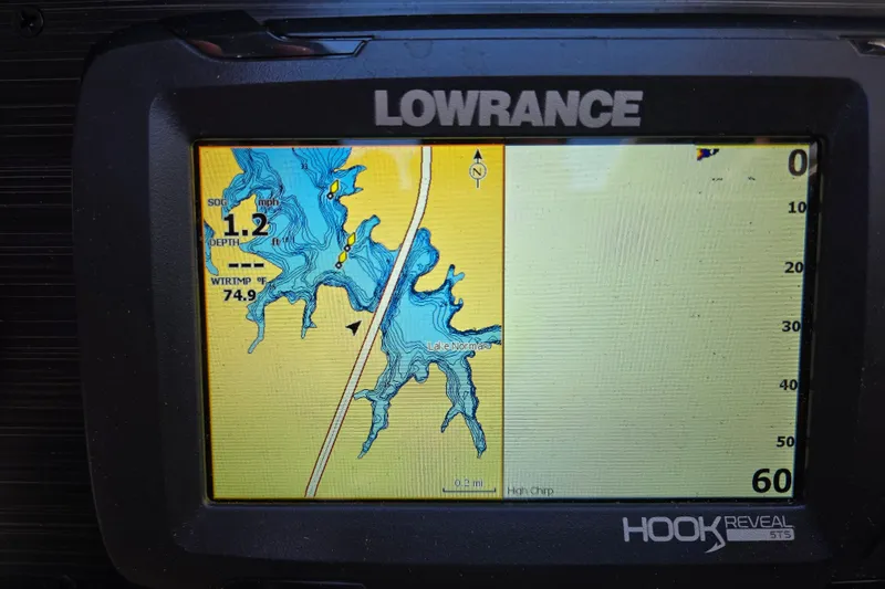 Slide: The Image of Lowrance Hook Reveal GPS displaying lake map on Godfrey Sweetwater 2486 SB, 2024 model. - 40