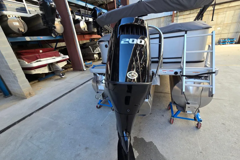 Slide: The Image of 2024 Godfrey Sweetwater 2486 SB pontoon boat with a 200 HP outboard motor. - 8