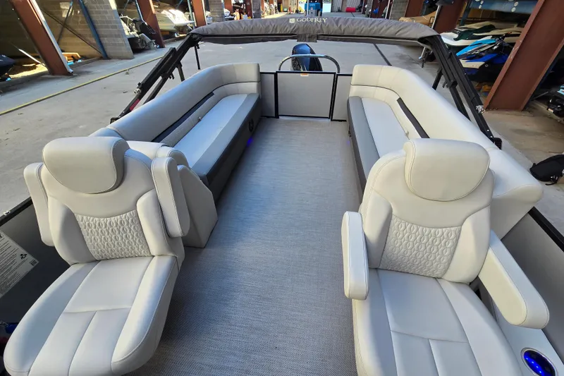 Slide: The Image of Luxurious interior of 2024 Godfrey Sweetwater 2486 SB pontoon boat with plush seating. - 22