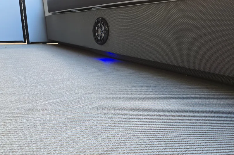 Slide: The Image of 2024 Godfrey Sweetwater 2486 SB interior with speaker and blue LED lighting. - 42