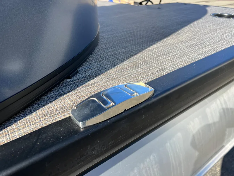 Slide: The Image of Close-up of a boat deck with a metal fitting. - 6