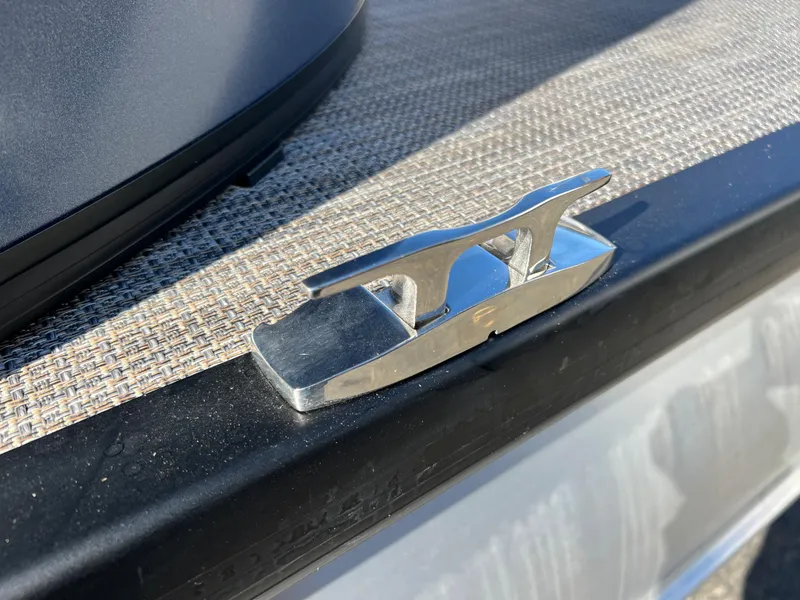 Slide: The Image of Close-up of a boat cleat on a 2023 Viaggio Lago 22U Tri Toon. - 7