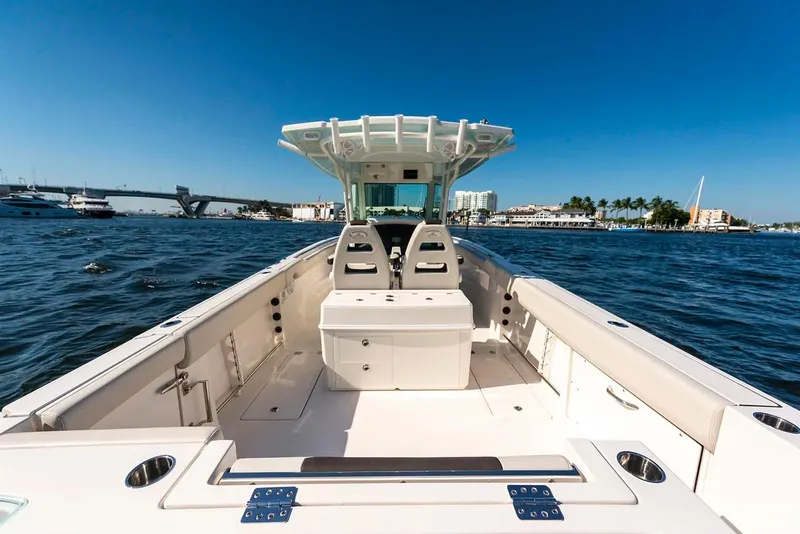 Slide: The Image of Manufacturer Provided Image: 2026 Sailfish 312 CC boat on open water, featuring spacious deck and modern design. - 6