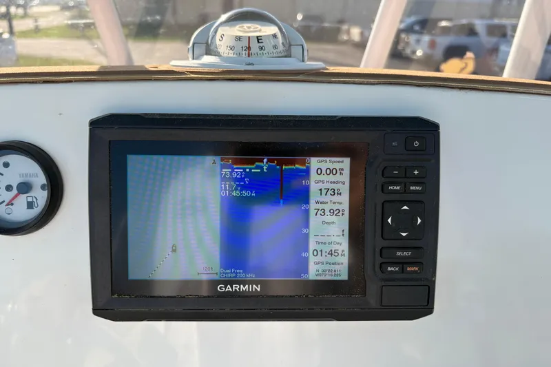 Slide: The Image of Garmin navigation display on 2019 NauticStar 231 Hybrid boat dashboard. - 15