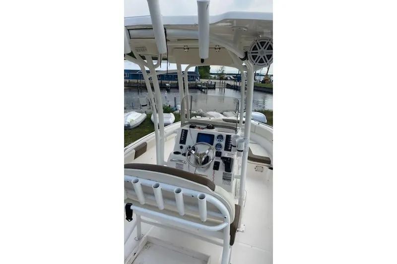 Slide: The Image of 2017 Robalo R222 Center Console boat interior with steering wheel and controls. - 7