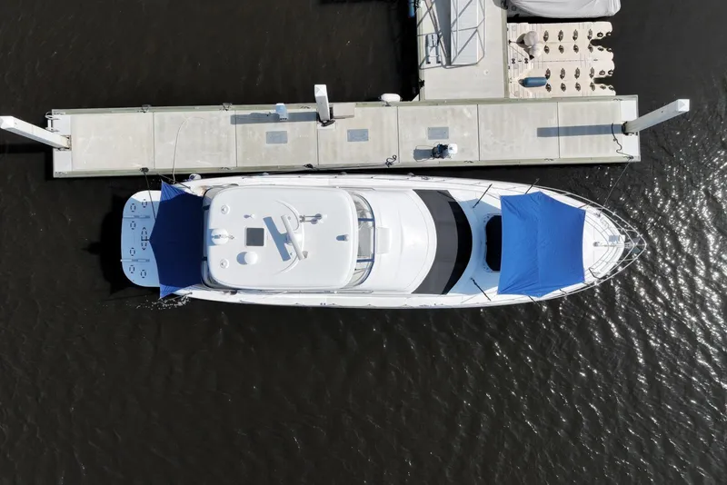 Slide: The Image of Aerial view of 2006 Sea Ray 580 Sedan Bridge yacht docked at marina. - 4