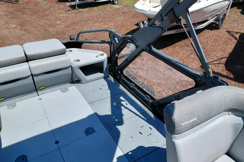 Slide: The Image of 2024 Sea-Doo Switch Cruise 18 interior with gray seating and open deck layout. - 30