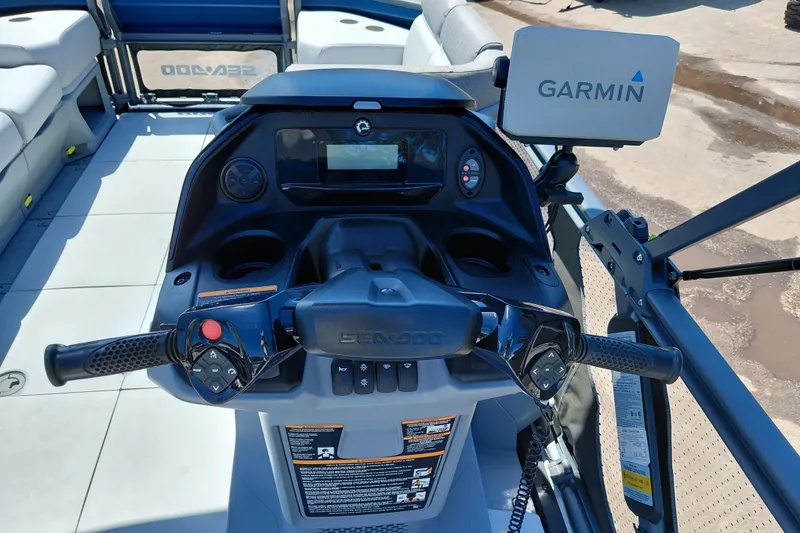 Slide: The Image of 2024 Sea-Doo Switch Cruise 18 dashboard with Garmin navigation system. - 20
