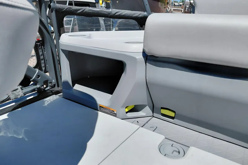 Slide: The Image of Interior seating and storage of 2024 Sea-Doo Switch Cruise 18 boat. - 26