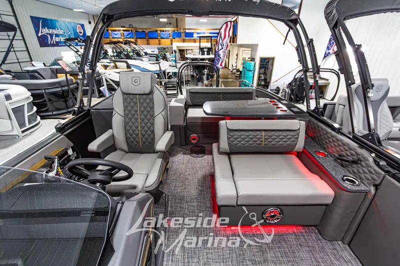 Slide: The Image of Interior of 2026 Godfrey Sanpan 2700 MTF pontoon boat at Lakeside Marina showroom. - 25