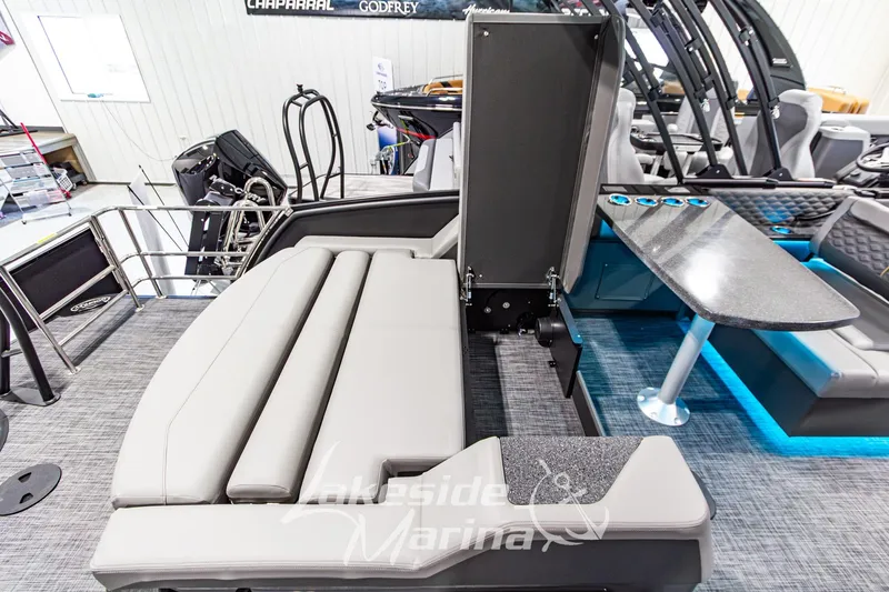 Slide: The Image of 2026 Godfrey Sanpan 2700 MTF luxury boat interior with seating and table. - 53