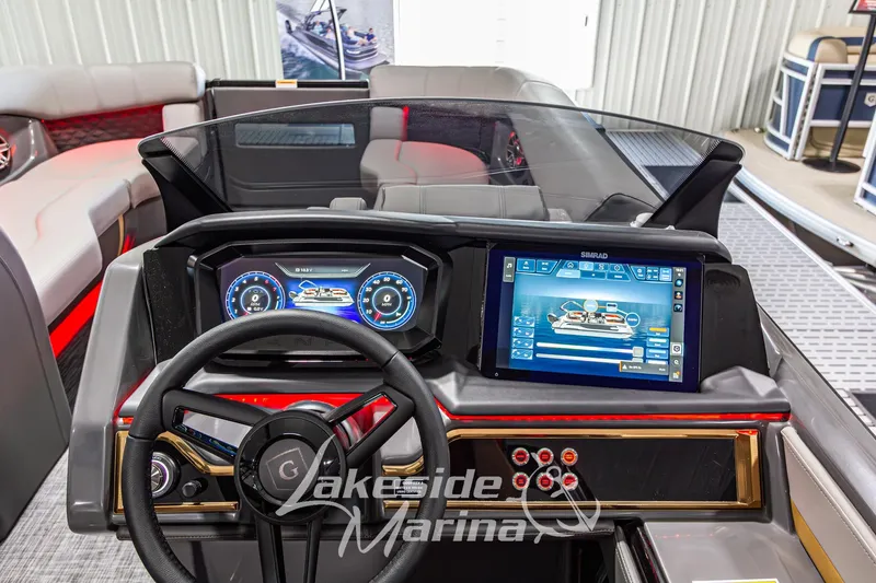 Slide: The Image of Interior view of 2026 Godfrey Sanpan 2700 MTF boat dashboard with advanced controls. - 35