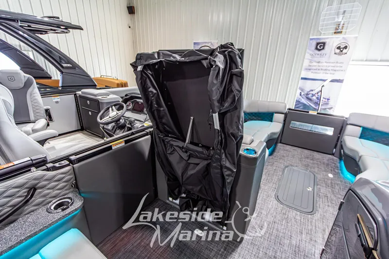 Slide: The Image of 2026 Godfrey Sanpan 2700 MTF interior with modern seating and steering console. - 27