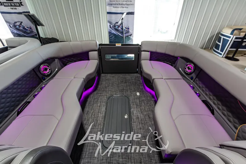 Slide: The Image of Luxurious interior of 2026 Godfrey Sanpan 2700 MTF pontoon boat with ambient lighting. - 15