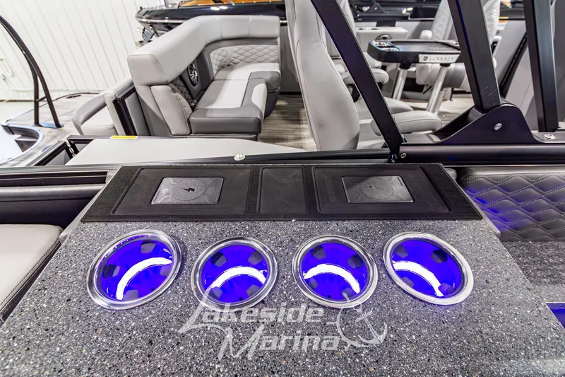 Slide: The Image of Luxurious interior of 2026 Godfrey Sanpan 2700 MTF pontoon boat with illuminated cup holders. - 45