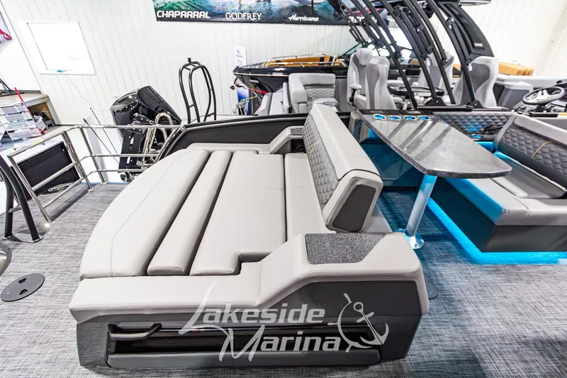 Slide: The Image of 2026 Godfrey Sanpan 2700 MTF luxury boat interior with plush seating and modern design. - 48