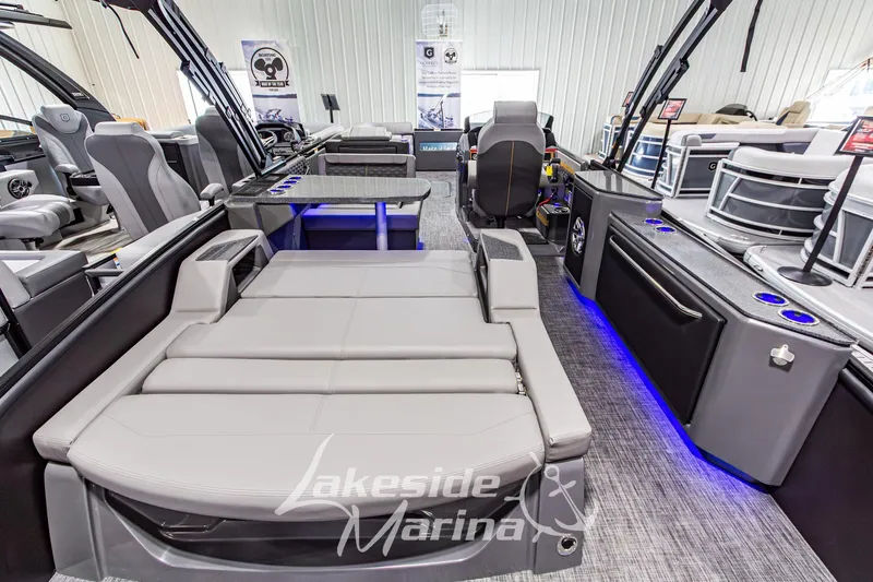 Slide: The Image of Luxurious 2026 Godfrey Sanpan 2700 MTF pontoon boat interior at Lakeside Marina. - 59