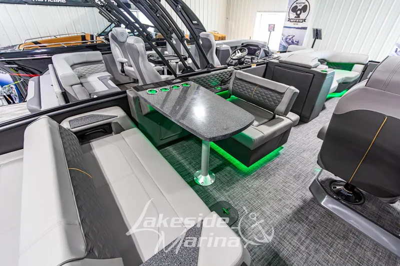 Slide: The Image of Luxurious interior of 2026 Godfrey Sanpan 2700 MTF pontoon boat with modern seating and table. - 44