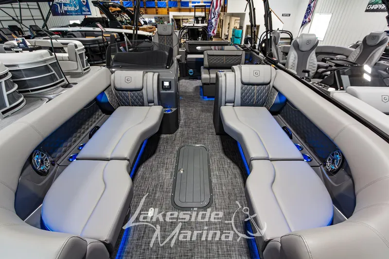 Slide: The Image of Luxurious interior of 2026 Godfrey Sanpan 2700 MTF pontoon boat with plush seating. - 12