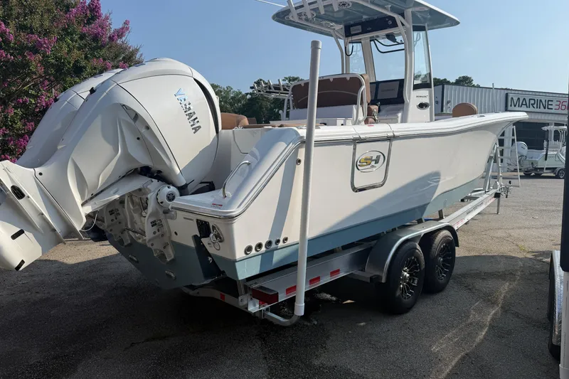 The Image of 2027 Sea Hunt Ultra 275 SE boat with Yamaha engine on trailer at Marine 360 dealership. - 1