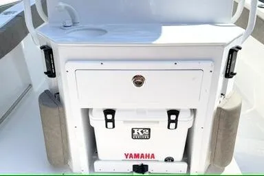 Slide: The Image of 2027 Sea Hunt Ultra 245 SE boat console with K2 cooler and Yamaha branding. - 9