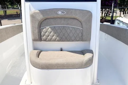 Slide: The Image of 2027 Sea Hunt Ultra 245 SE boat seat with quilted design and logo. - 26