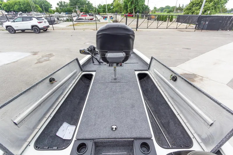 Slide: The Image of 2023 Tracker Pro Team 190 TX boat interior with open storage compartments. - 25