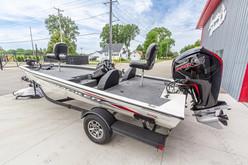 Slide: The Image of 2023 Tracker Pro Team 190 TX boat with Mercury Pro XS engine, parked outdoors. - 3