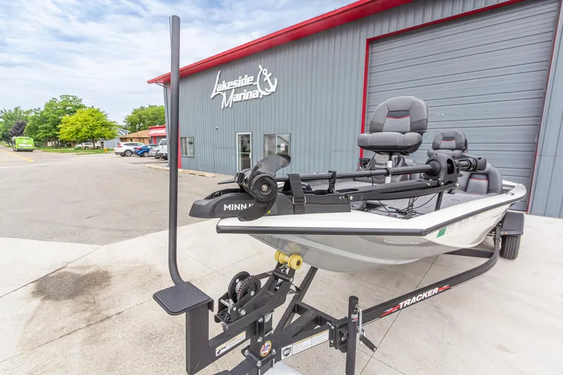 Slide: The Image of 2023 Tracker Pro Team 190 TX boat at Lakeside Marina, featuring Minn Kota trolling motor. - 10
