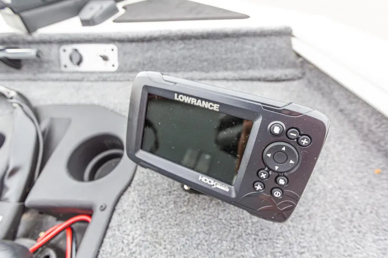 Slide: The Image of Fishfinder on 2023 Tracker Pro Team 190 TX boat dashboard, featuring Lowrance Hook technology. - 28