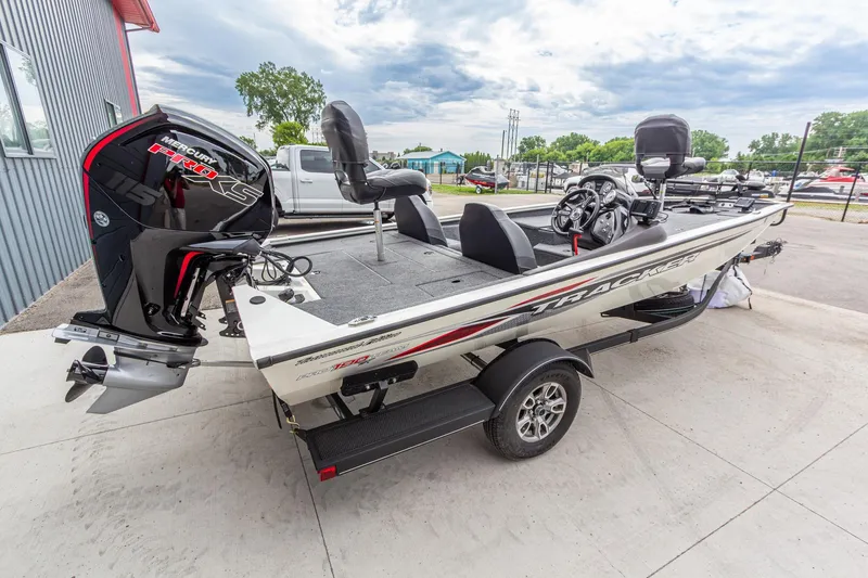 Slide: The Image of 2023 Tracker Pro Team 190 TX boat with Mercury Pro XS engine on trailer. - 7
