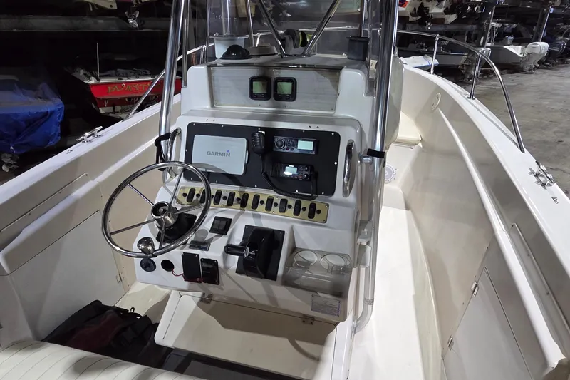 Slide: The Image of 1994 Grady-White Chase 263 boat console with Garmin navigation system. - 14