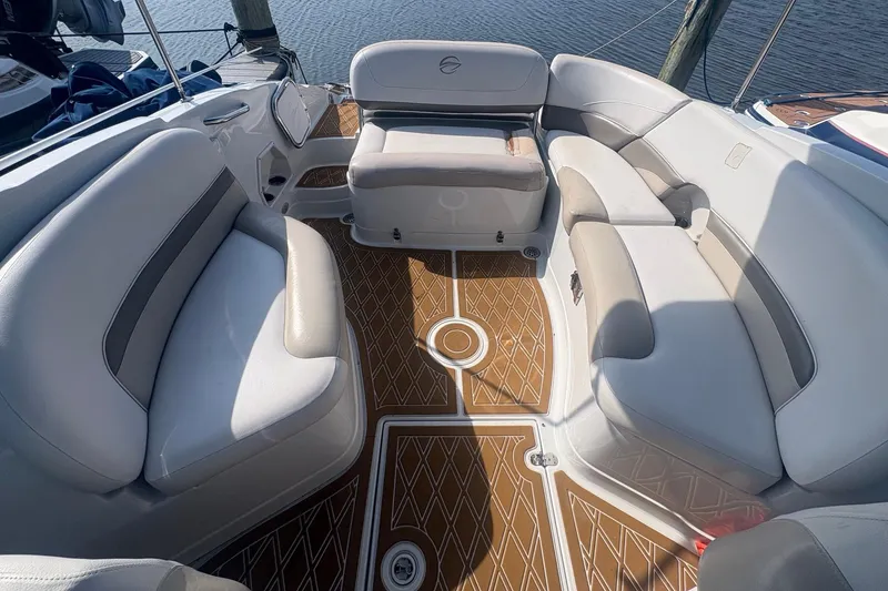 Slide: The Image of Spacious seating area on a 2013 Crownline Eclipse E6 boat with elegant flooring. - 4