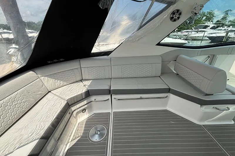 Slide: The Image of 2024 Sea Ray Sundancer 320 Outboard interior with luxurious seating and modern design. - 20