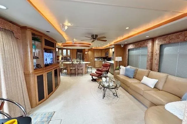 Slide: The Image of Luxurious 2007 Sumerset 18x86 houseboat interior with elegant living area and modern kitchen. - 2