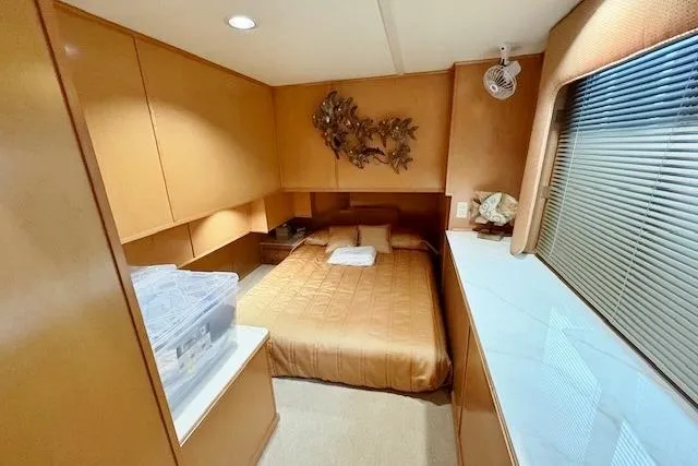 Slide: The Image of Luxurious bedroom interior of 2007 Sumerset 18x86 houseboat with cozy bed and elegant decor. - 7