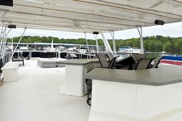 Slide: The Image of Spacious deck of 2007 Sumerset 18x86 houseboat with bar and seating area. - 15