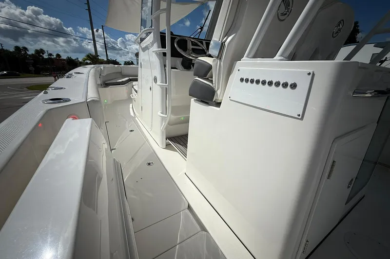 Slide: The Image of 2022 Edgewater 340CC boat interior with sleek design and modern controls. - 22