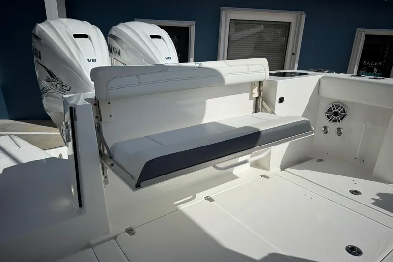 Slide: The Image of 2022 Edgewater 340CC boat with Yamaha V8 engines and foldable seating. - 15