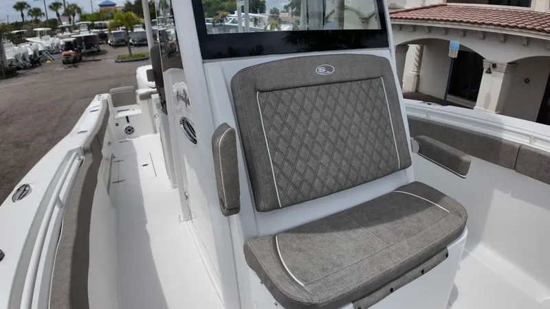 Slide: The Image of The image shows the seating area of a 2026 Sea Hunt Gamefish 30 Forward Seating boat. - 42