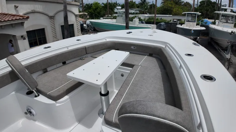 Slide: The Image of The image shows the forward seating area of a 2026 Sea Hunt Gamefish 30. - 34