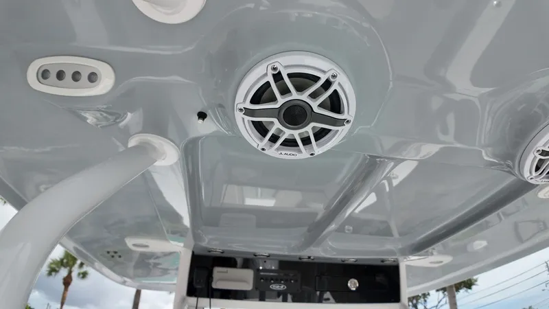 Slide: The Image of Close-up of a boat's roof with speakers and lights. - 26